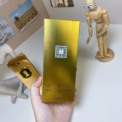 Paco Rabanne 1 Million Golden Oud bottle held in hand showing gold bar design